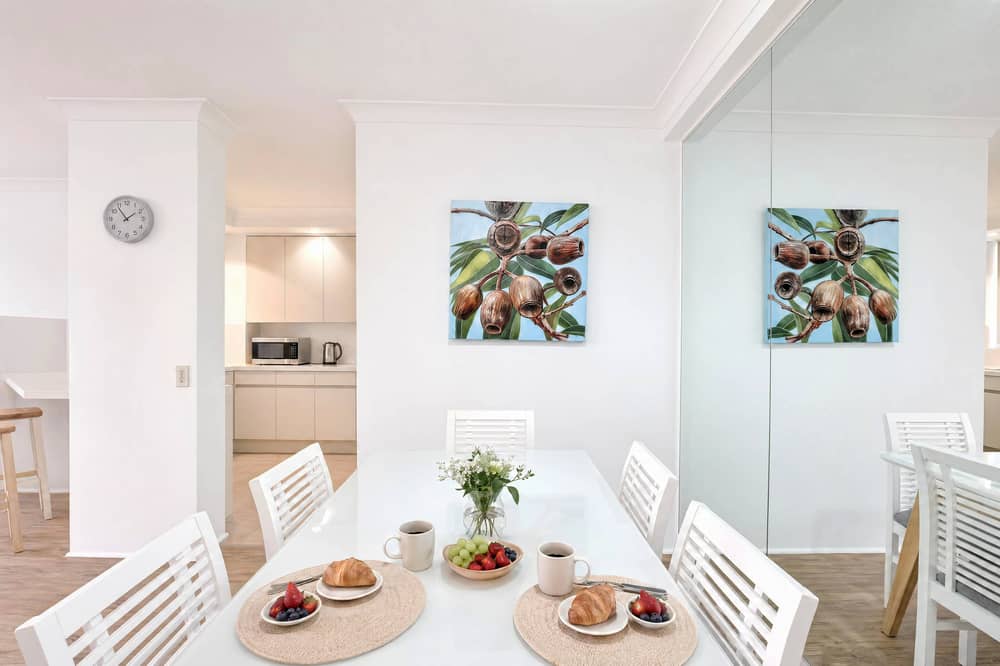 Apartment 193, dining with native-fruit artwork